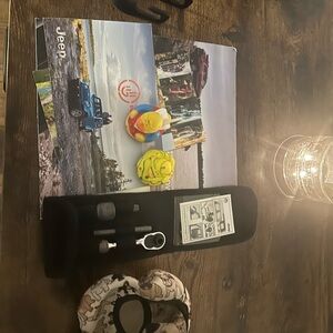 Jeep accessories: steering wheel cov,& wheel lock kit, headrest hooks for purse.
